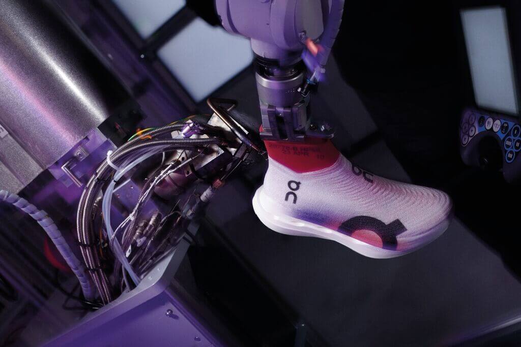 On LightSpray running shoe being manufactured using automated robotic technology