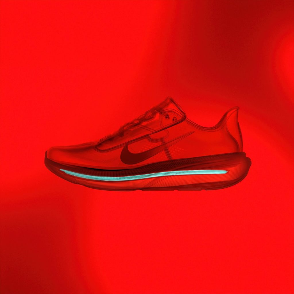 Nike Pegasus 42 i profil. Genomskärning med infrarött ljus som visar mellansulan och dämpningen.